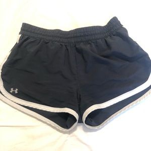 Black Under Armour track shorts.
